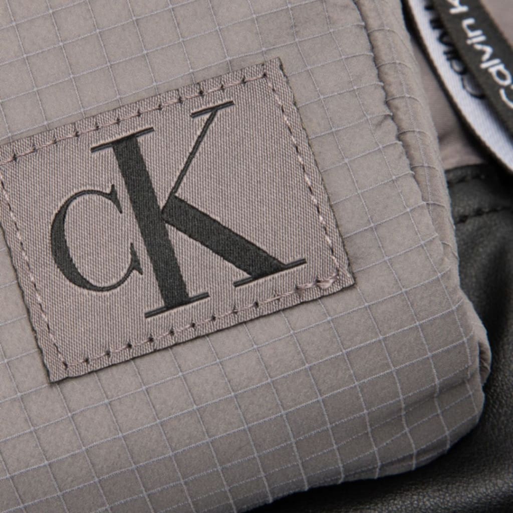 Calvin Klein Metal Buckle Flap Woven Label Backpack HH3076-GRY - Gray - Bags